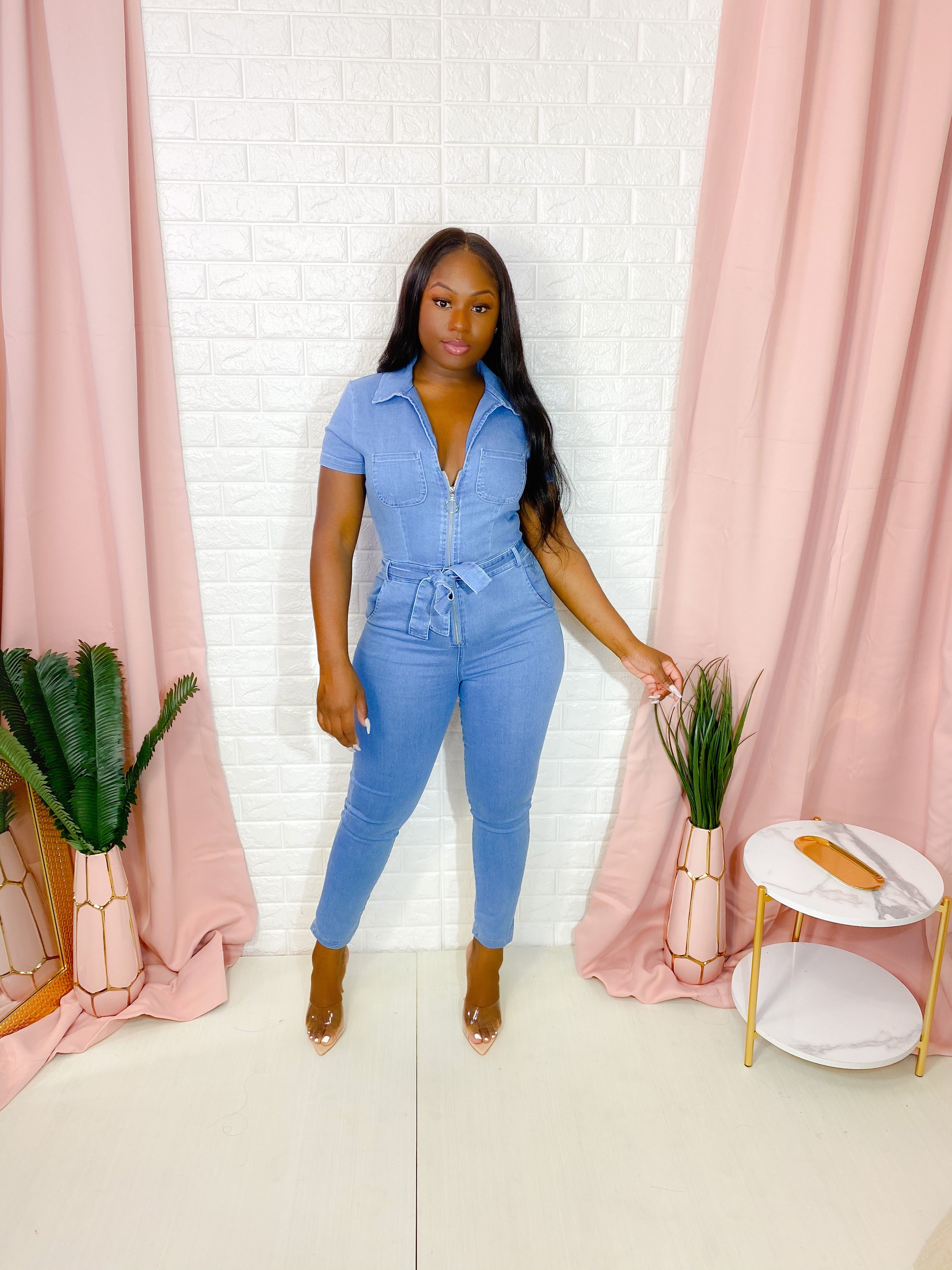 MEDIUM BLUE WASH DENIM JUMPSUIT.