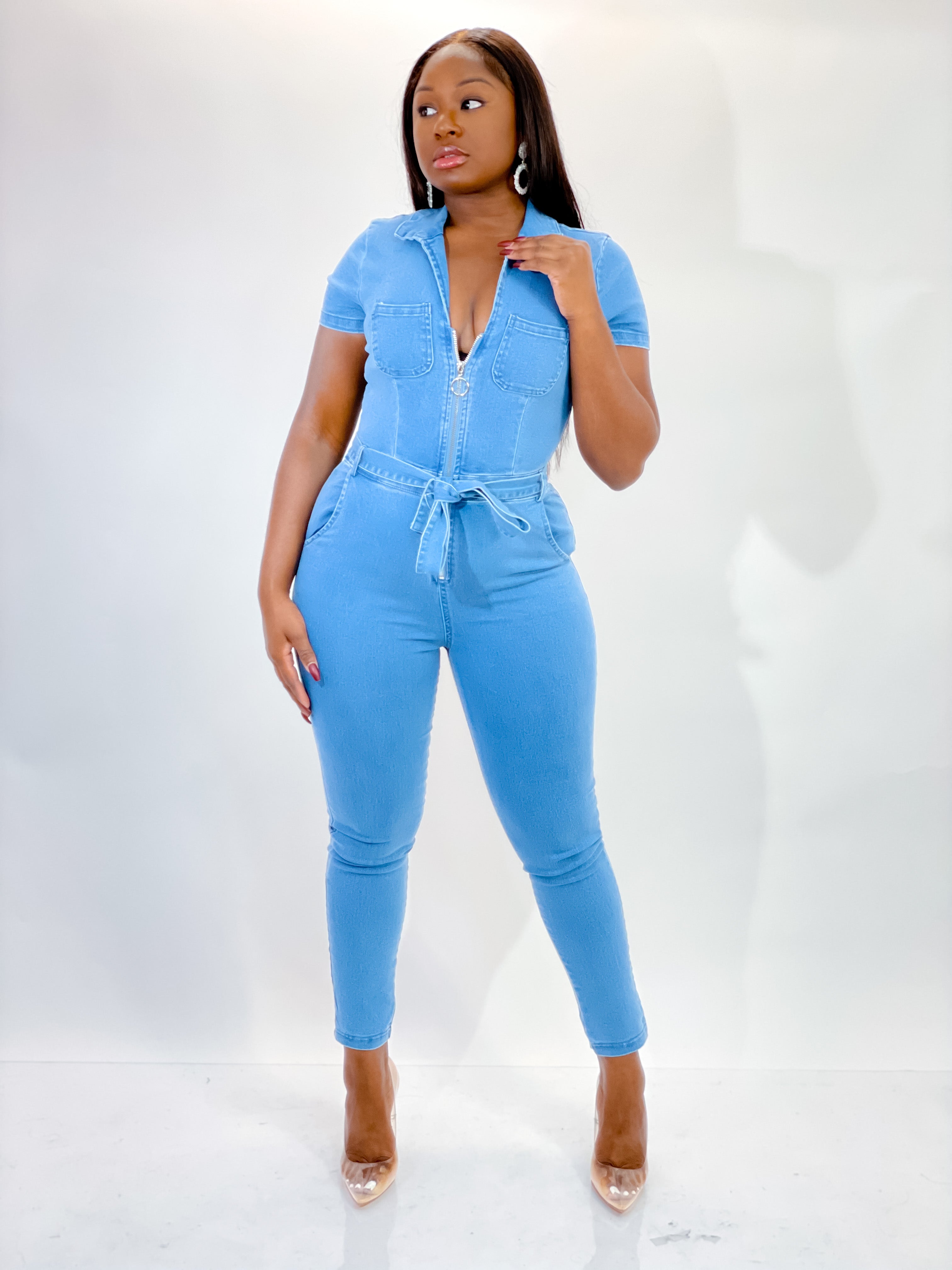 MEDIUM BLUE WASH DENIM JUMPSUIT.