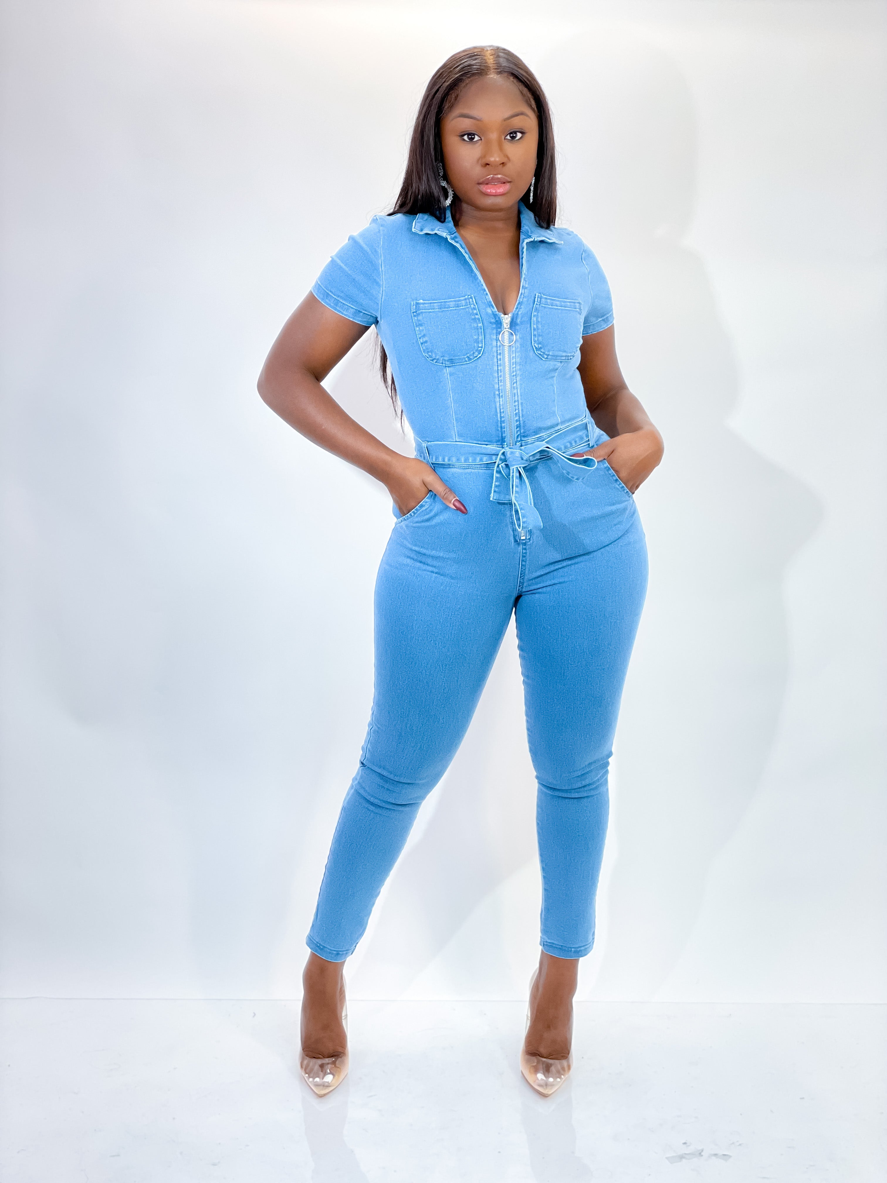 MEDIUM BLUE WASH DENIM JUMPSUIT.