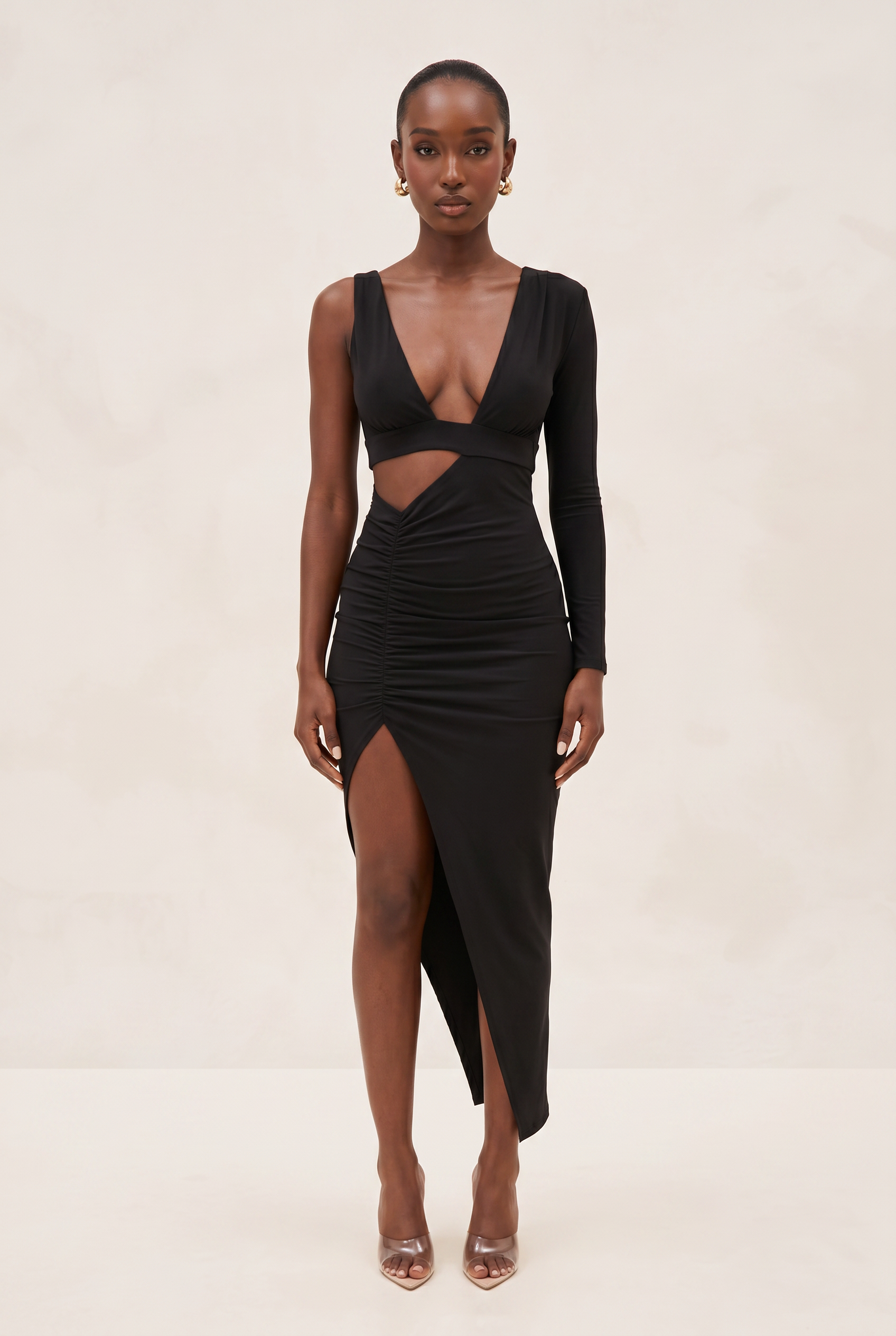 Black dress with cut-out design on a white background